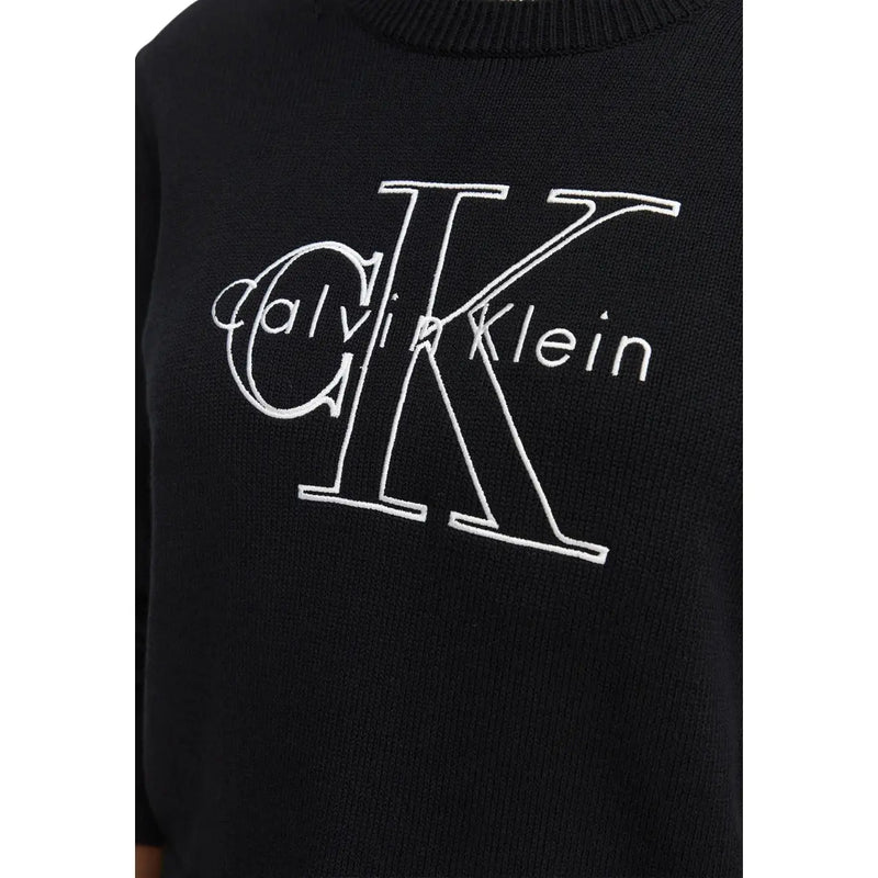 Schwarzer Calvin Klein Baumwollstrickpullover für Damen mit einem markanten weißen gestickten CK-Logo auf der Vorderseite