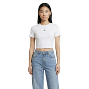Weiße, kurzgeschnittene Baumwolle t-shirt mit kleinem schwarzen CK-Logo auf der Brust von Calvin Klein Jeans Damen