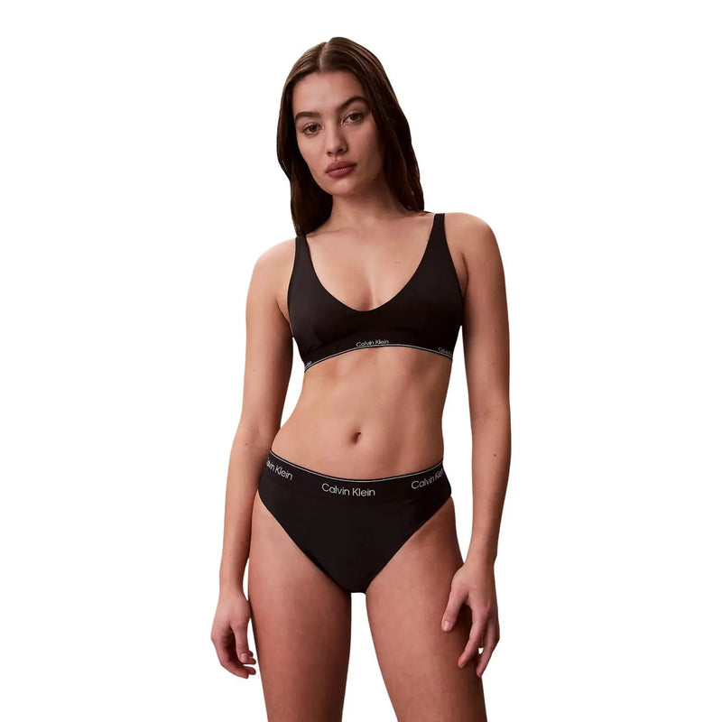 Black Calvin Klein halter bralette and underwear set with white logo trim for women beachwear