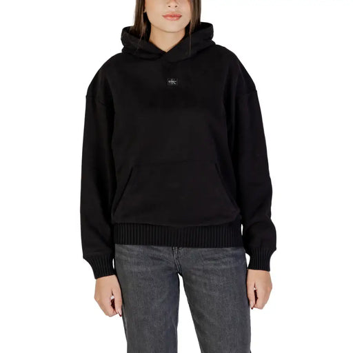 Calvin Klein Jeans women black hooded sweatshirt with ribbed cuffs and hem featuring small embroidered logo on chest