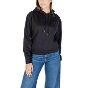 Calvin Klein Jeans Schwarzer Damen-Kapuzenpullover mit dezentem, gesticktem Logo und passenden Kordelzügen aus Baumwollmischgewebe.