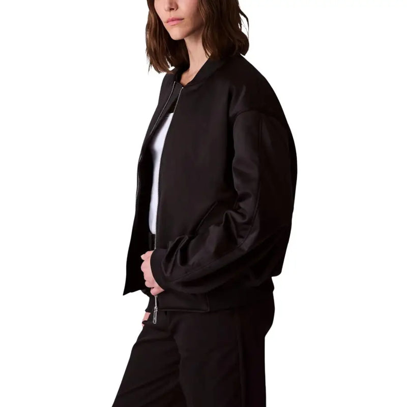 Calvin Klein Jeans women black polyester bomber jacket with sleek fitted silhouette and ribbed cuffs