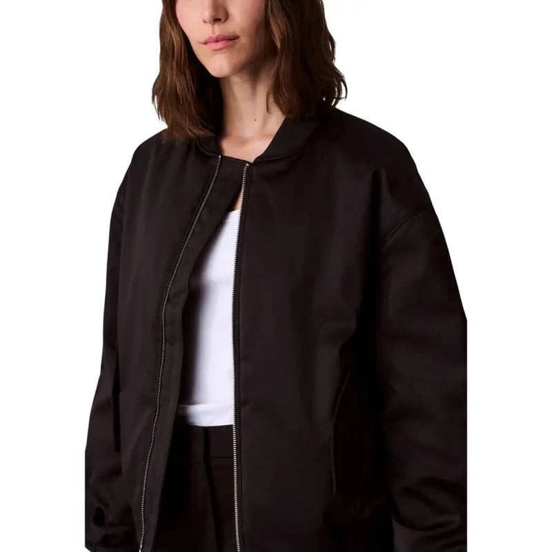 Calvin Klein Jeans women black polyester bomber jacket with sleek modern design and silver zipper accents