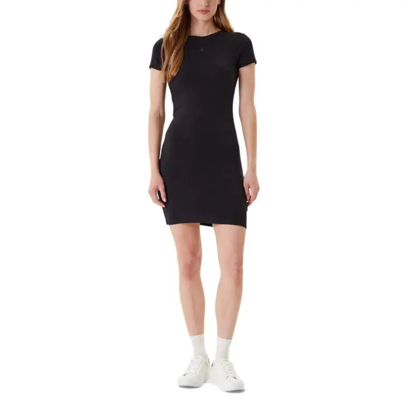 Woman wearing Calvin Klein Jeans black short round neck cotton elastane dress