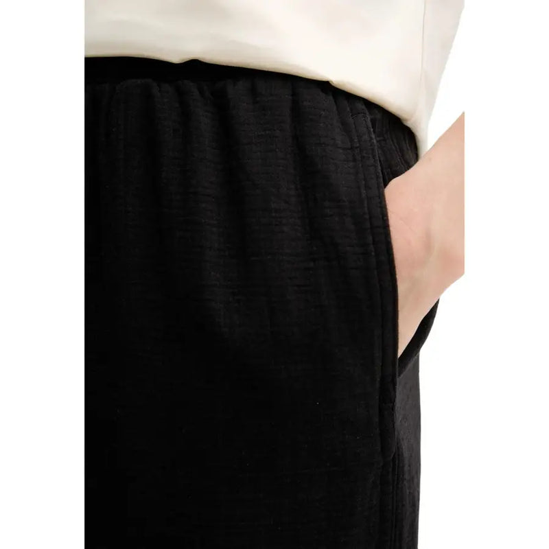 Calvin Klein Jeans women black linen trousers with relaxed fit elastic waistband fall winter style