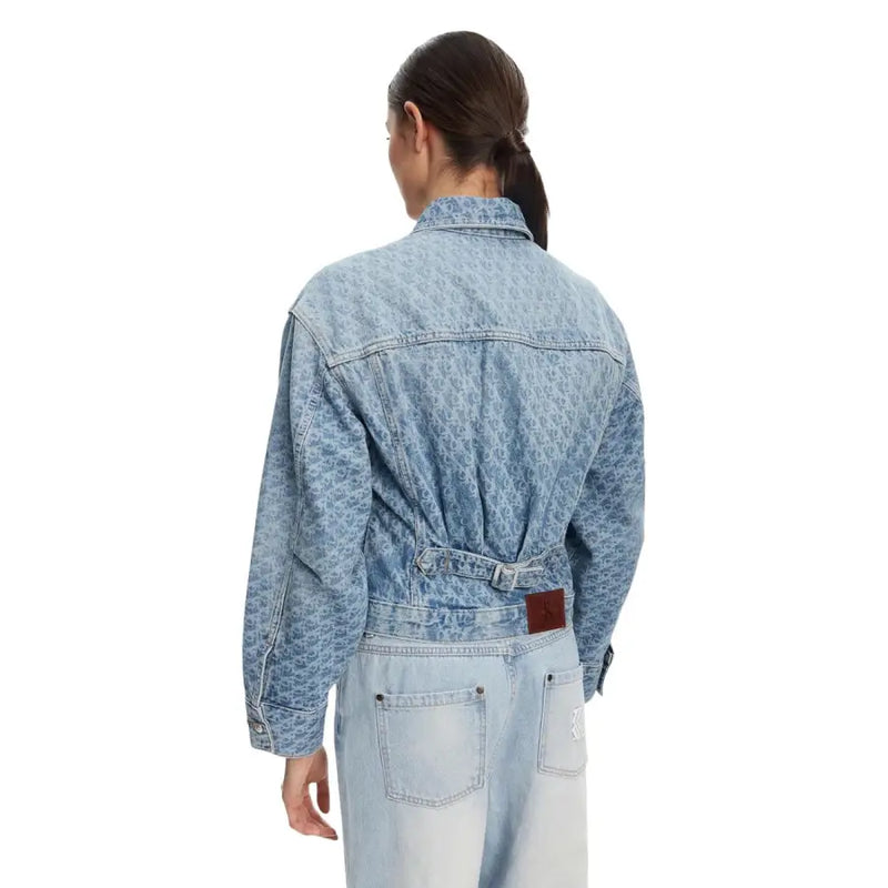 Calvin Klein Jeans women blue cotton blazer with light blue denim, subtle leopard print, front pockets, and brown leather patch