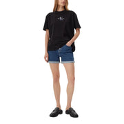 Black calvin klein t-shirt with white and blue logo paired with calvin klein jeans women blue cotton shorts