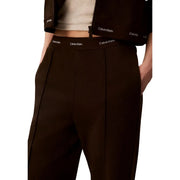 Calvin Klein Jeans Damen-Baumwollhose in Braun mit taillierter Passform und dezentem weißen Markenlogo am Bund