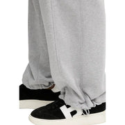 Calvin Klein Jeans women grey cotton trousers with relaxed fit, pockets, and elastic cuffs in heathered fabric