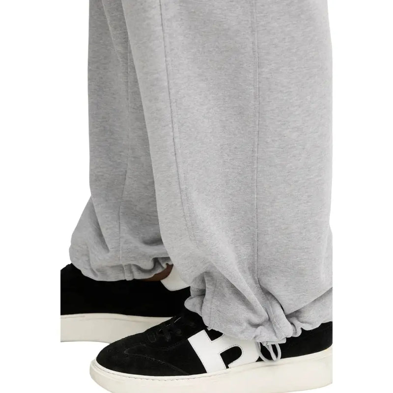 Calvin Klein Jeans women grey cotton trousers with relaxed fit, pockets, and elastic cuffs in heathered fabric