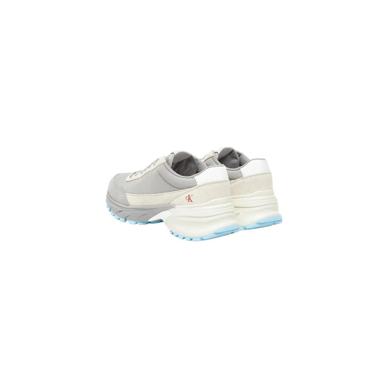 Calvin Klein Jeans women grey leather chunky sneakers with white accents and a light blue sole featuring logo on side