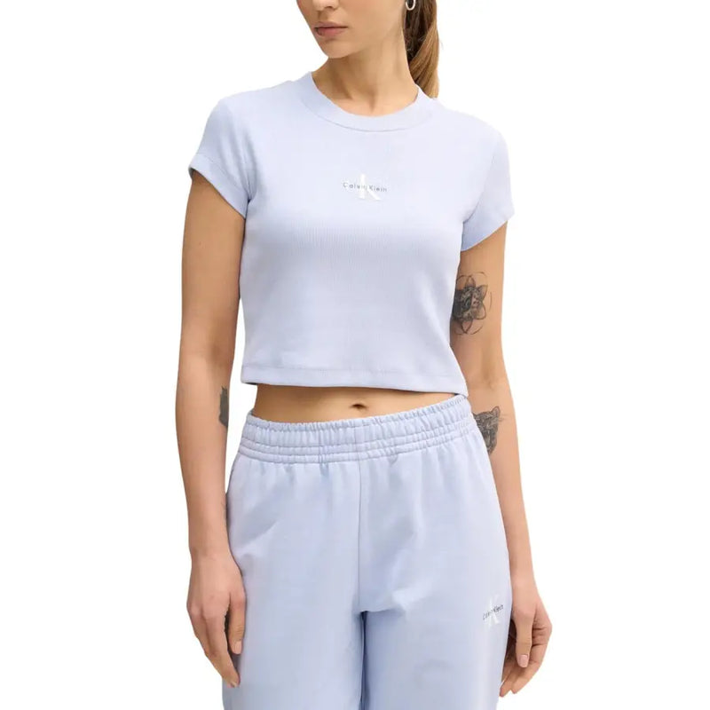 Calvin Klein light blue cropped short sleeve t-shirt with white logo