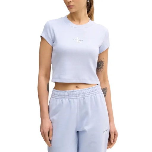 Calvin Klein light blue cropped short sleeve t-shirt with white logo