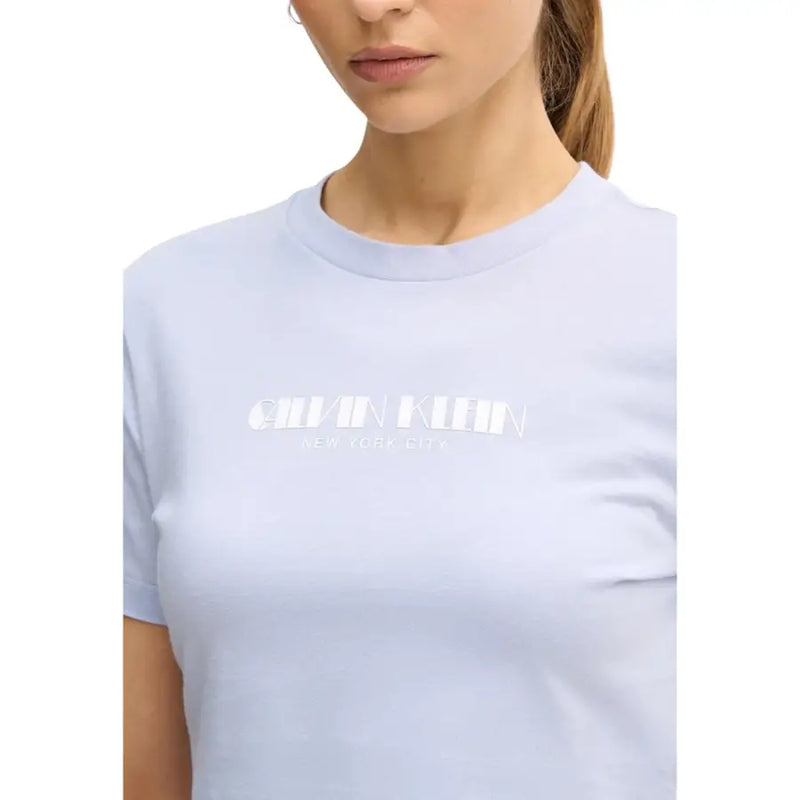 Light blue Calvin Klein Jeans women lilac print cotton T-shirt with white Calvin Klein New York City logo on chest