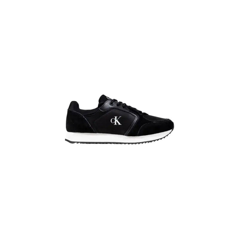 Calvin Klein Jeans women slip on black sneaker with suede and leather upper white rubber sole and silver logo