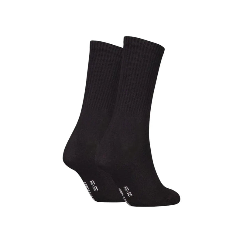 Schwarze, gerippte Socken aus Baumwollmischgewebe mit dezentem weißen Logo an der Ferse aus der Damenunterwäschekollektion von Calvin Klein Jeans.