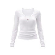 Weißes, geripptes Langarmshirt aus Baumwoll-Lycra top für Damen mit dezentem Calvin Klein Logo-Patch auf der Brust