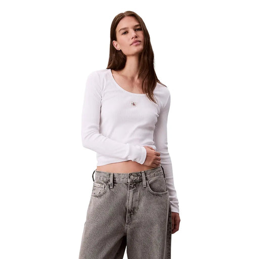 White cotton lycra long sleeve crop top with small embroidered Calvin Klein logo on the chest for women