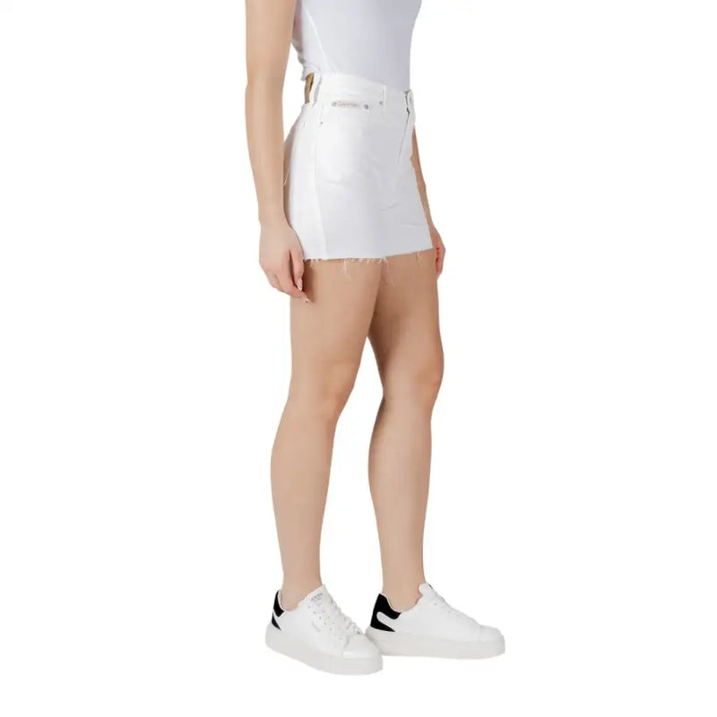 Calvin Klein Jeans women white cotton high-waisted denim mini skirt with a frayed hem front view