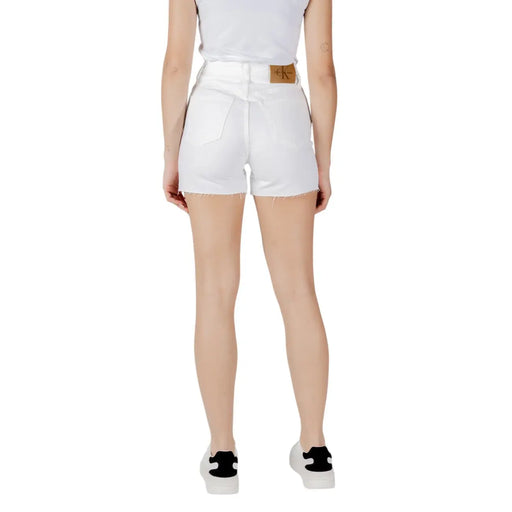 Calvin klein jeans women white high-waisted cotton denim shorts with frayed hem and brown leather brand patch back view