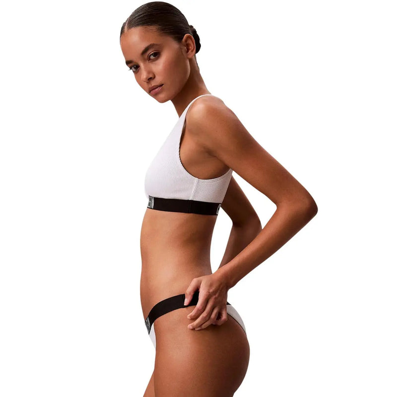 White ribbed nylon sports bra with black elastic band and matching briefs by calvin klein jeans women Brazilian beachwear