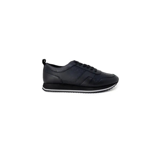 Calvin Klein men black leather sneakers with sleek minimalist design and subtle textured panels on the upper