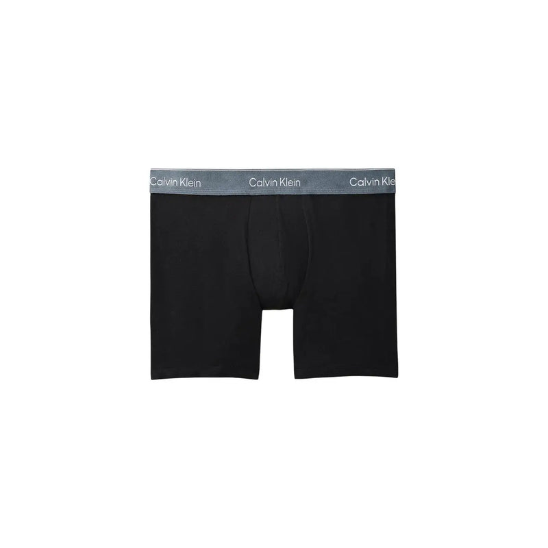 Black Calvin Klein boxer briefs with a gray waistband featuring the brand logo for men’s underwear use