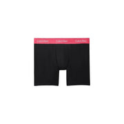 Black Calvin Klein men underwear boxer briefs with pink elastic waistband featuring white logo for everyday wear