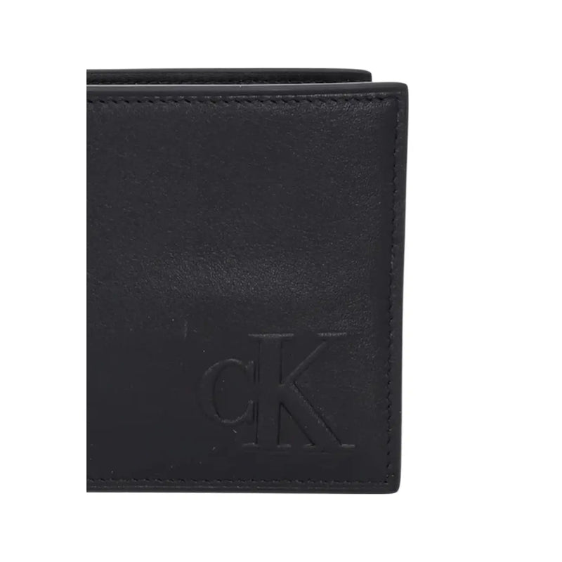 Calvin Klein men wallet in black leather with embossed CK logo showcasing the front side design