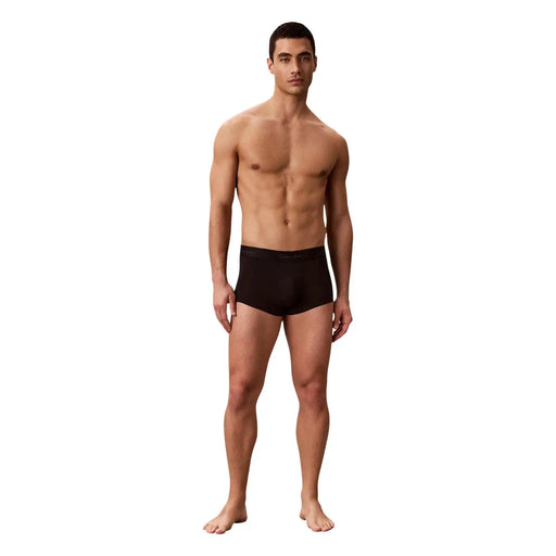 Black men’s briefs by Calvin Klein underwear featuring smooth, form-fitting design in black for everyday comfort