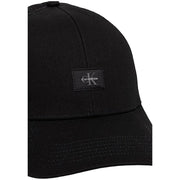Calvin Klein Schwarze Herren-Truckerkappe aus Baumwolle mit Monologo, dezent strukturiertem Stoff und kleinem, gesticktem Logo-Aufnäher