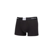 Black Calvin Klein men’s boxer briefs with white logo waistband designed for comfortable everyday underwear use