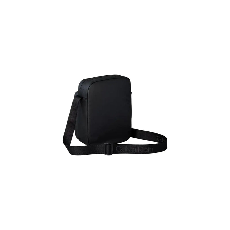 Schwarz Calvin Klein Herren-Puffertasche im Reporter-Stil mit elegantem, minimalistischem Design und strukturiertem Material, Größe W16