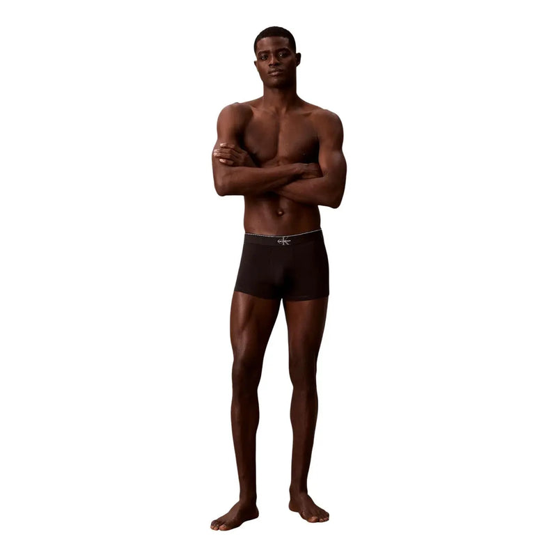 Black calvin klein men underwear boxer briefs with silver logo trim in premium fabric for comfortable wear