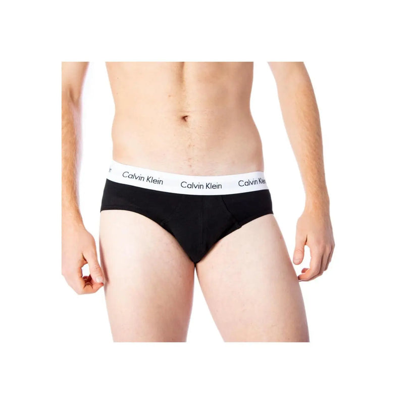 Black Calvin Klein men’s briefs with a white elastic waistband featuring the brand’s repeating logo in cotton fabric