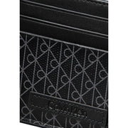 Calvin Klein Schwarze Herren-Geldbörse mit Kartenfach, dezentem geometrischem Muster und genähten Lederdetails