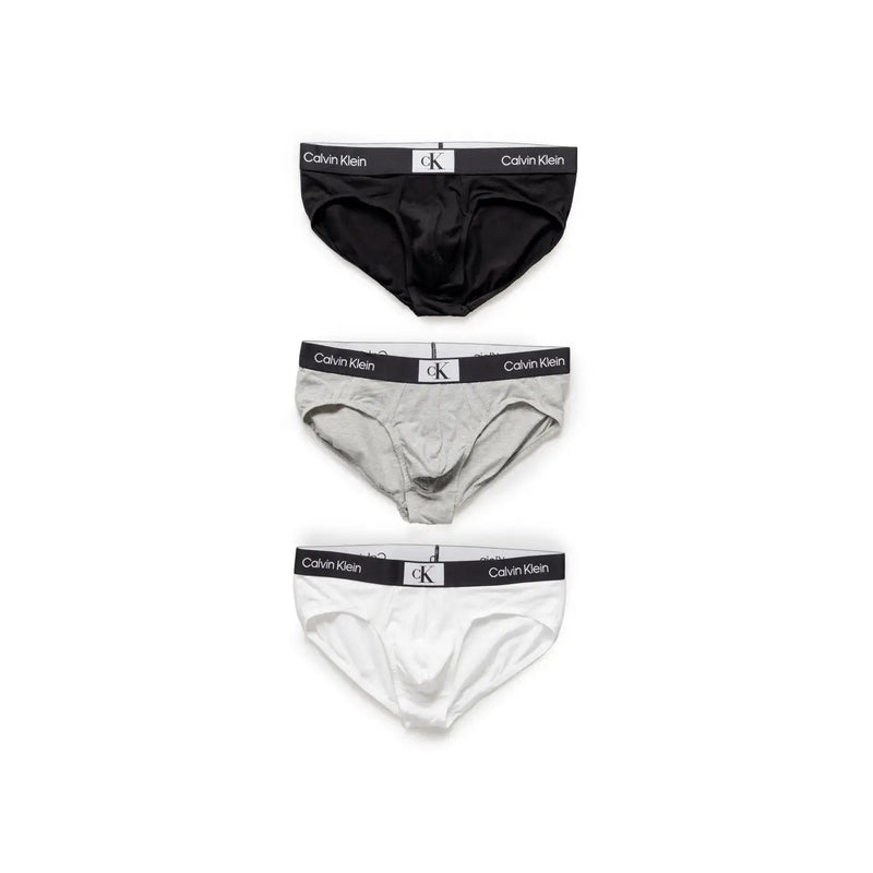 Set of three Calvin Klein men’s underwear briefs in black gray and white designed for comfort and daily wear