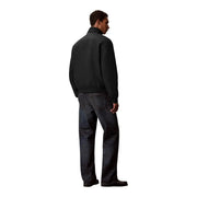 Schwarze Nylon-Bomberjacke von Calvin Klein für Herren mit gerippten Bündchen und Saum – perfekt für die Freizeit.
