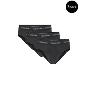 Dreierpackung schwarz Calvin Klein Damenslips ausgestellt mit Calvin Klein Herrenunterwäsche