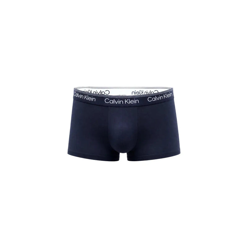 Dark navy calvin klein men’s briefs with white elastic waistband featuring black brand lettering for comfortable wear