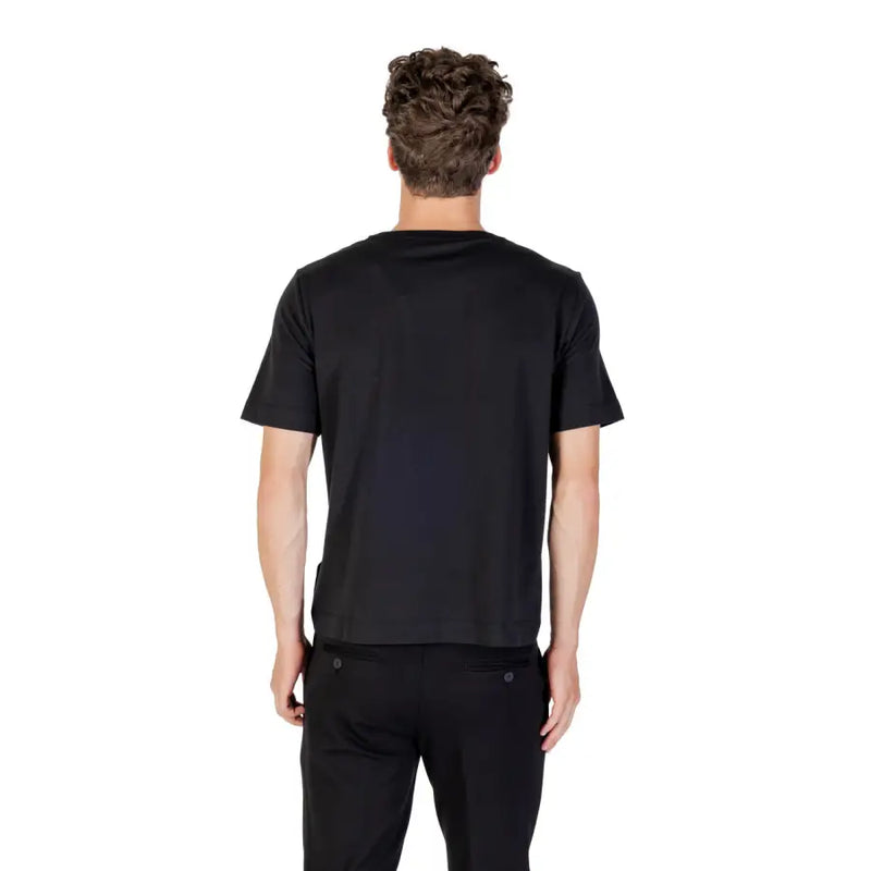 Men’s black short-sleeved round neck T-shirt and black pants from Calvin Klein Sport