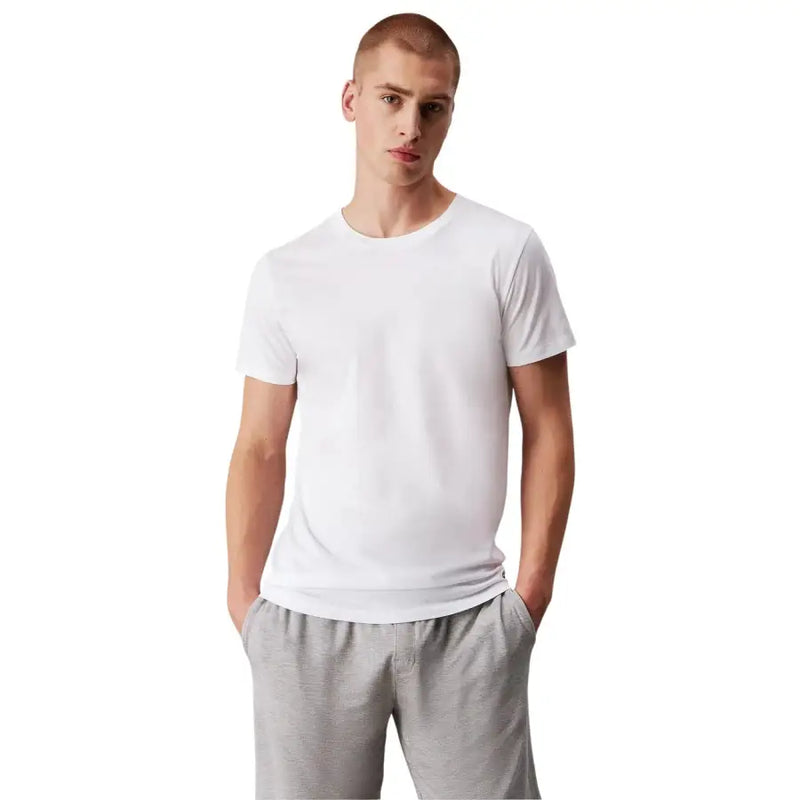 Weißer Baumwollpullover mit Rundhalsausschnitt t-shirt Aus der Calvin Klein Herrenunterwäschekollektion – entworfen für Komfort und Stil