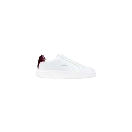 White leather slip-on sneaker with burgundy heel tab and sole detail, inspired by alexander mcqueen.