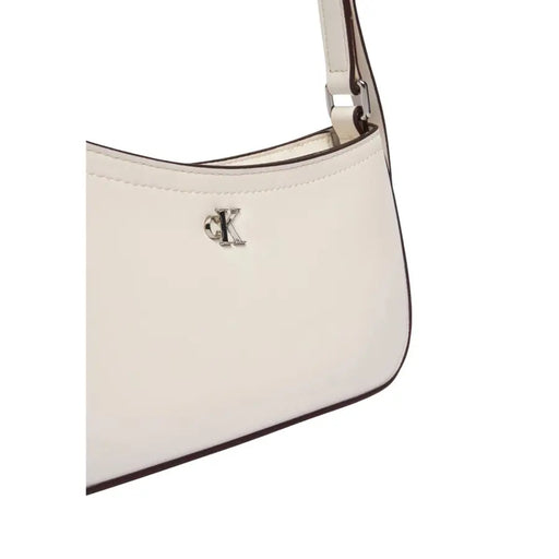 Calvin Klein white women’s leather shoulder bag with zip inside pockets silver-tone CK logo and dark brown trim