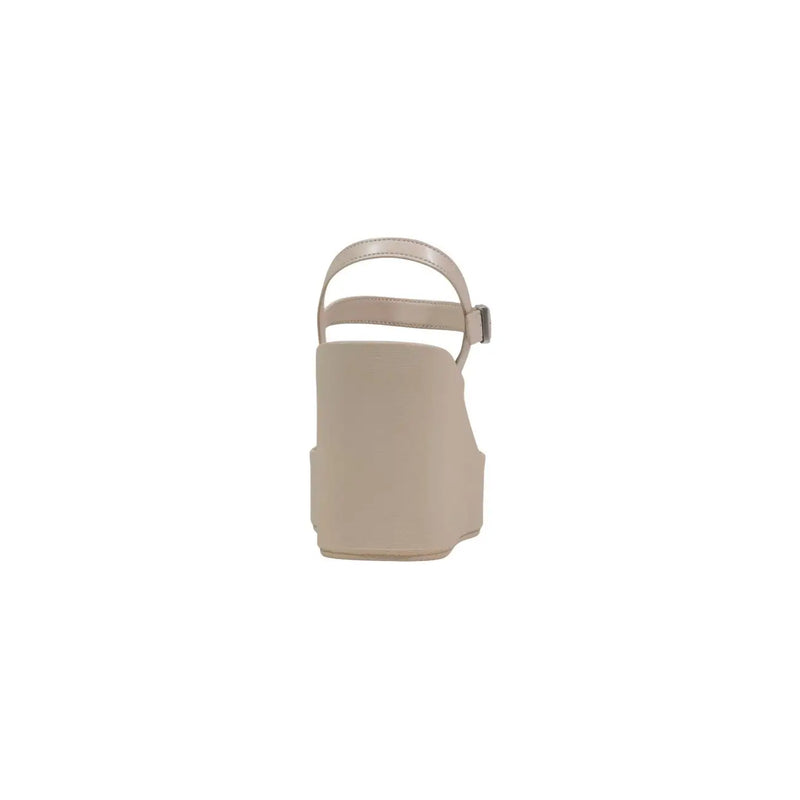 Calvin Klein women beige platform sandal with sleek minimalist design and metallic buckle for stylish wear