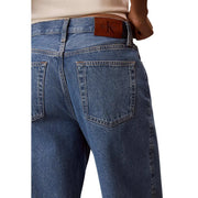Calvin Klein Damen-Jeans aus blauem Baumwoll-Denim, die Rückseite zeigt, mit einem braunen Leder-Markenpatch am Bund