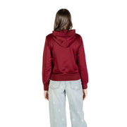 Calvin klein women bordeaux hooded fall winter sweatshirt in rich burgundy satin with glossy finish and ribbed cuffs