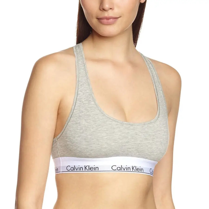Calvin Klein women grey marl sleeveless slip on sports bra with white elastic band featuring black logo