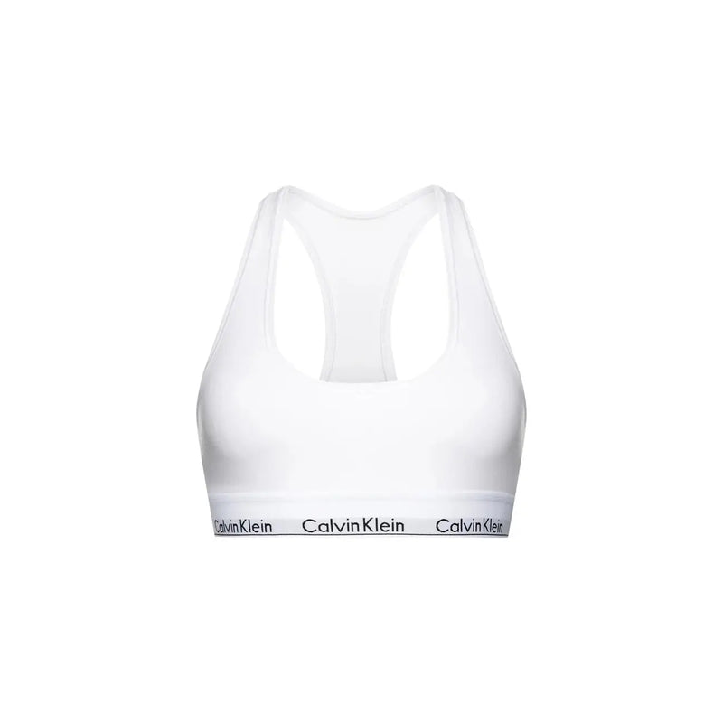 White calvin klein sports bra with black logo band, designed for women, combines comfort and stylish support