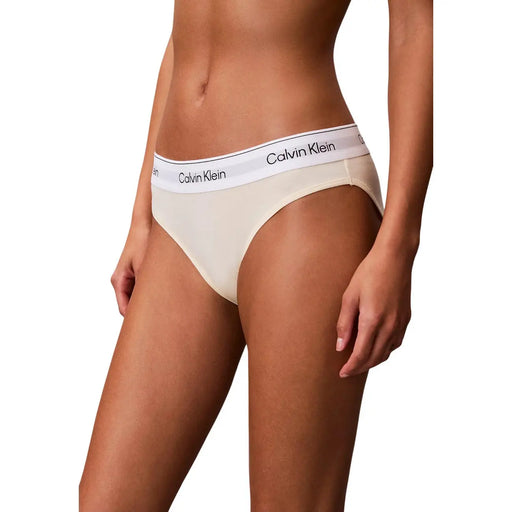 Cream-colored calvin klein briefs with white waistband logo, polyamide material, part of women light blue bikini underwear line